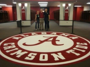 Mateja Loncar, Andy Billings, and Simon Ličen in the Crimson Tide locker room at Bryant-Denny Stadium